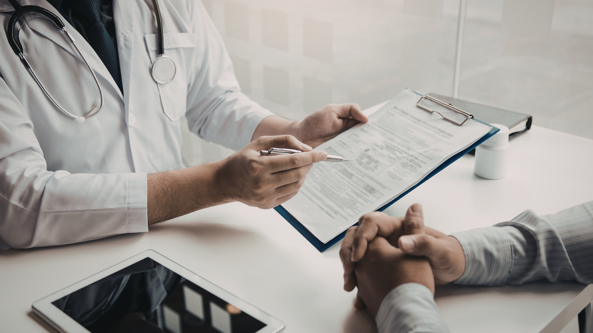 Doctor consulting with patient